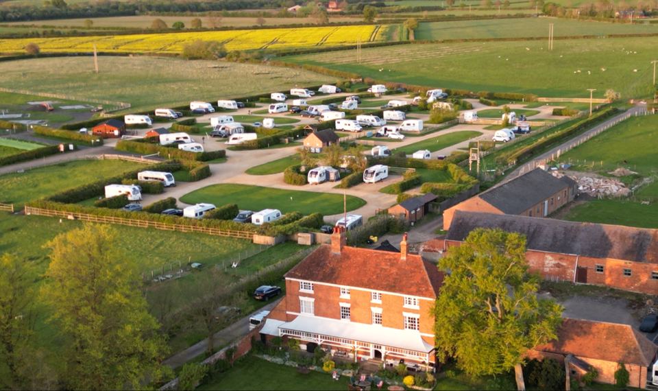 Site and farmhouse from the air