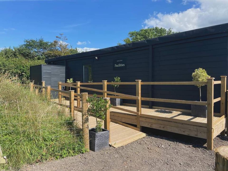 Dark cabin with decked path