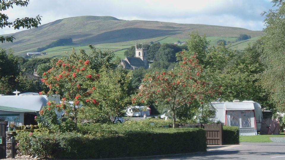 Pitches with Hawes church behind