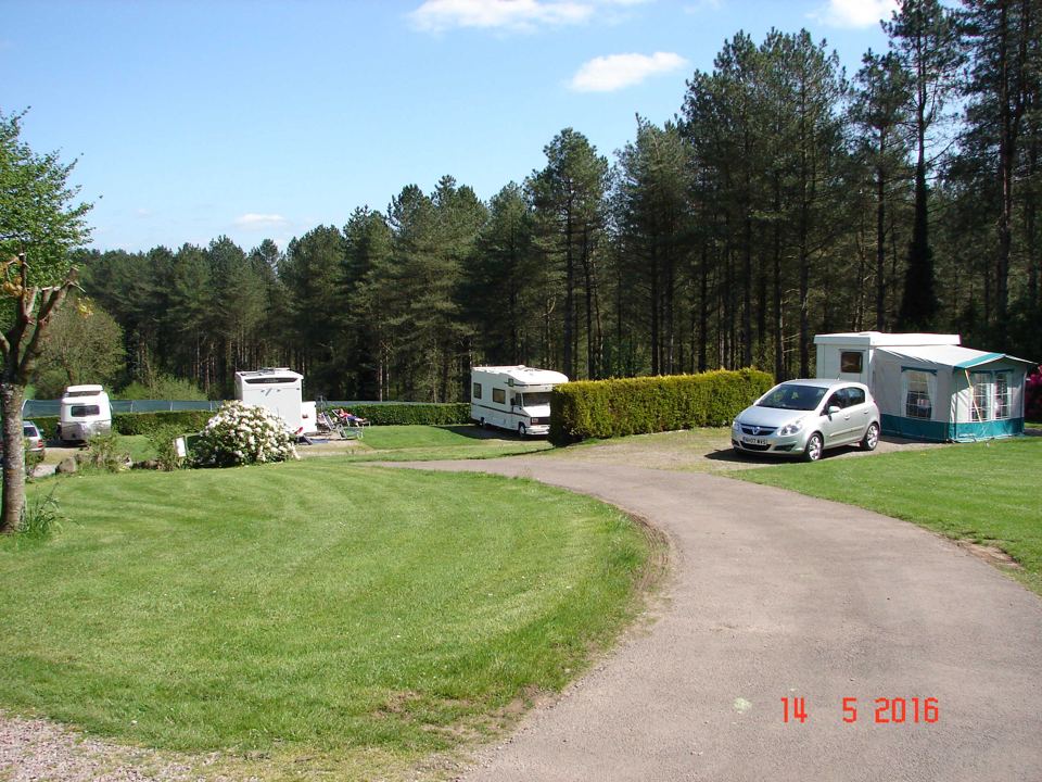 Pitches curving round the lawn