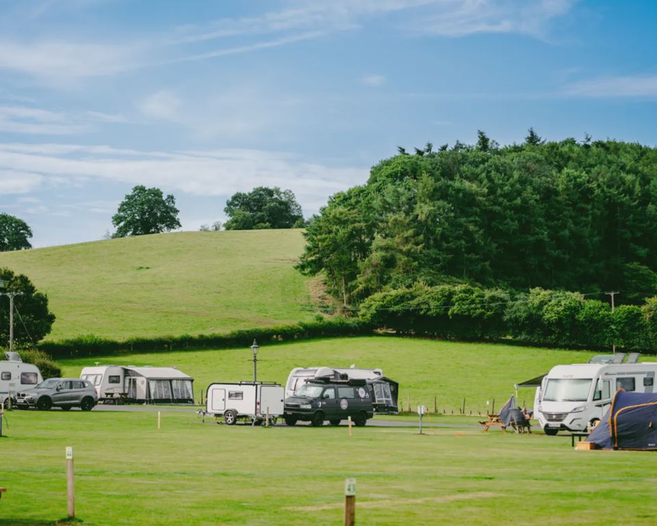 Touring field with hill views