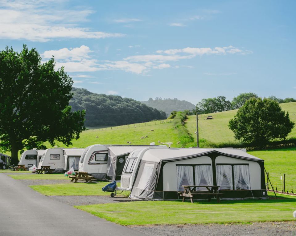 Row of caravans with awnings