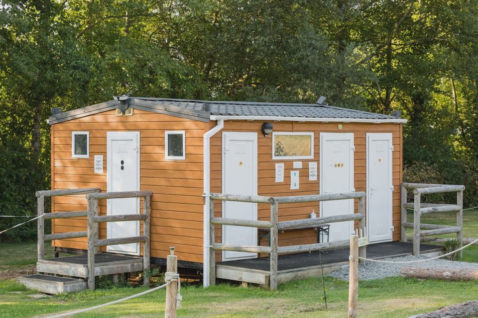 Toilet and shower block
