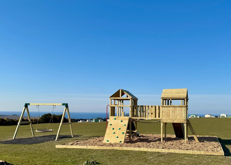 Play frame with sea beyond