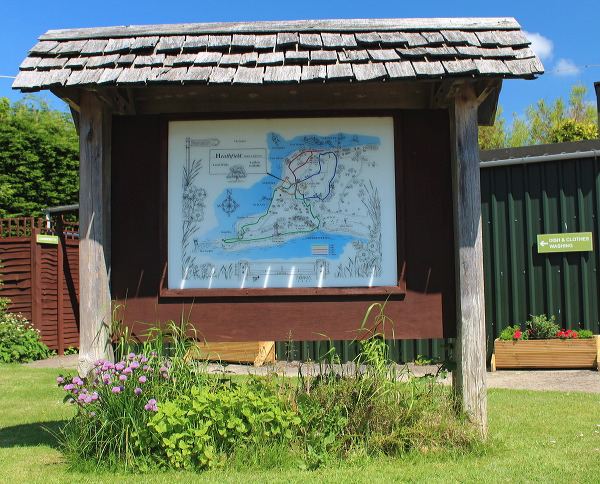 Site noticeboard and map by reception
