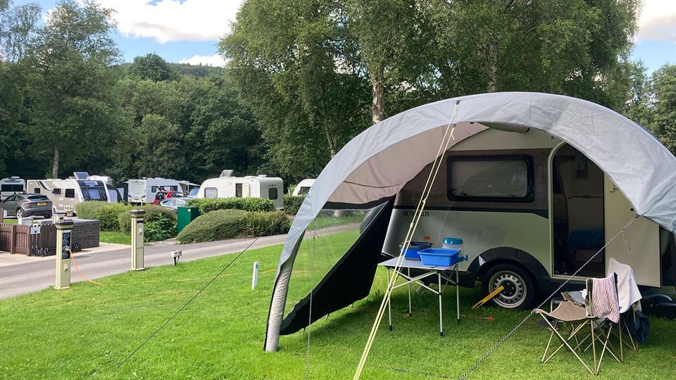 Small trailer tent with awning