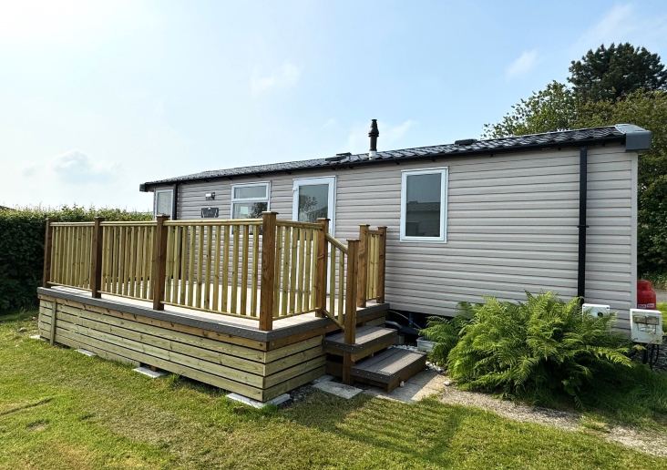 Static caravan on decking