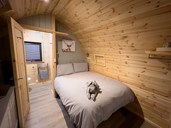 Bed in a wigwam cabin