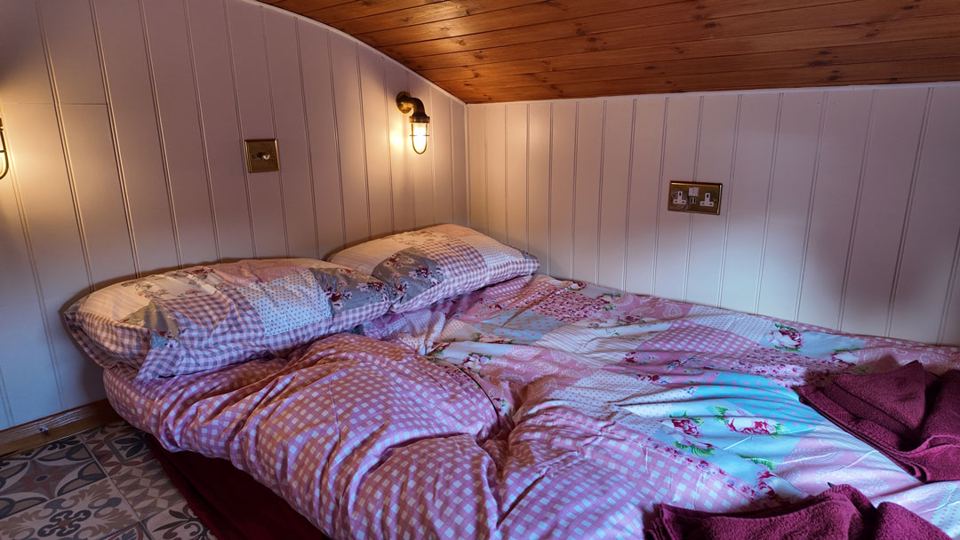 Bed inside a shepherd hut