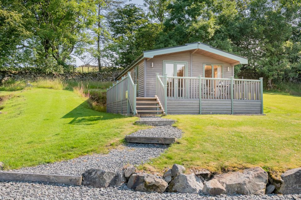 Lodge along a stone path