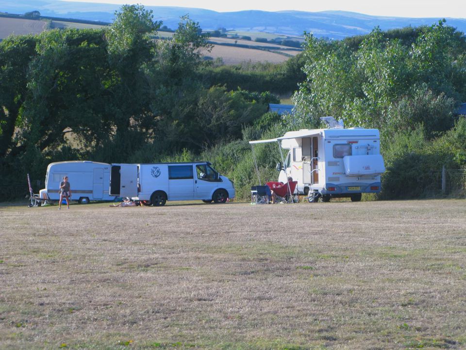Campervans on the open field