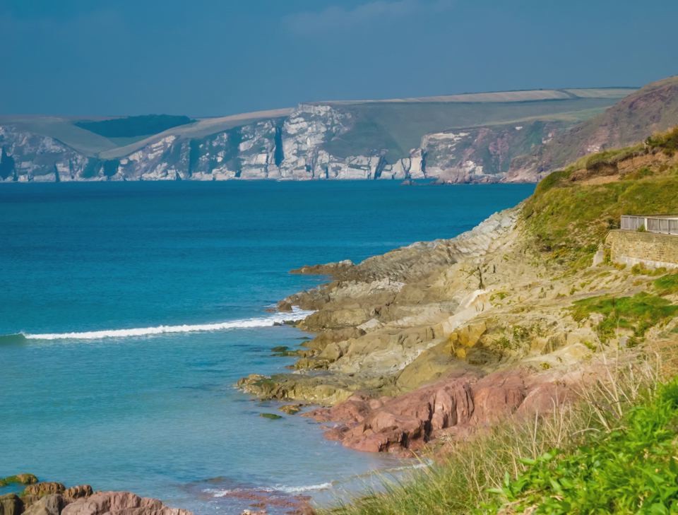 Red cliffs and sea nearby