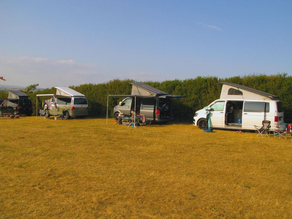 Campervans at the field edge