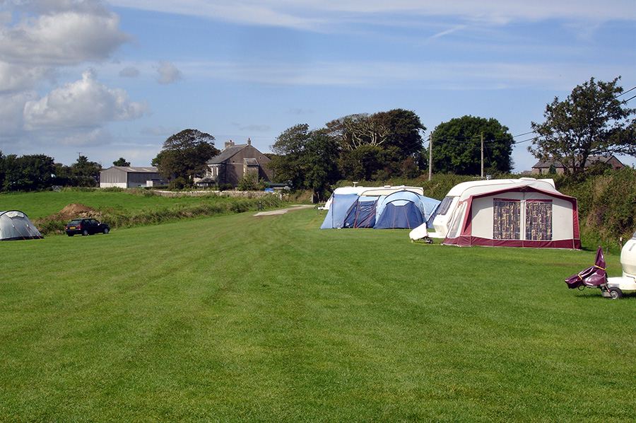Tents on the mown grass
