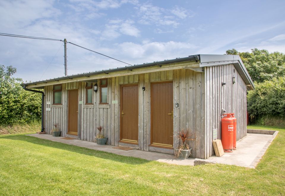 Toilet and shower block