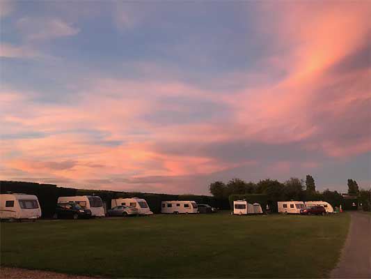 Row of tourers at sunset