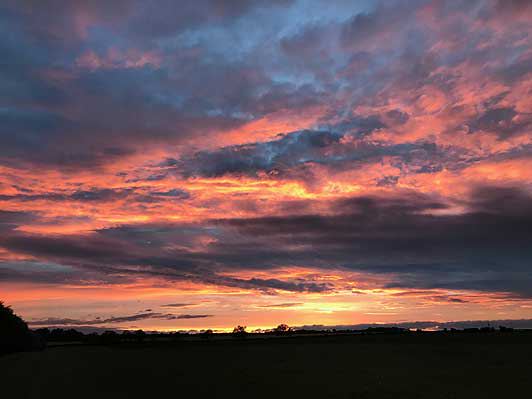 Sunset sky over the fields