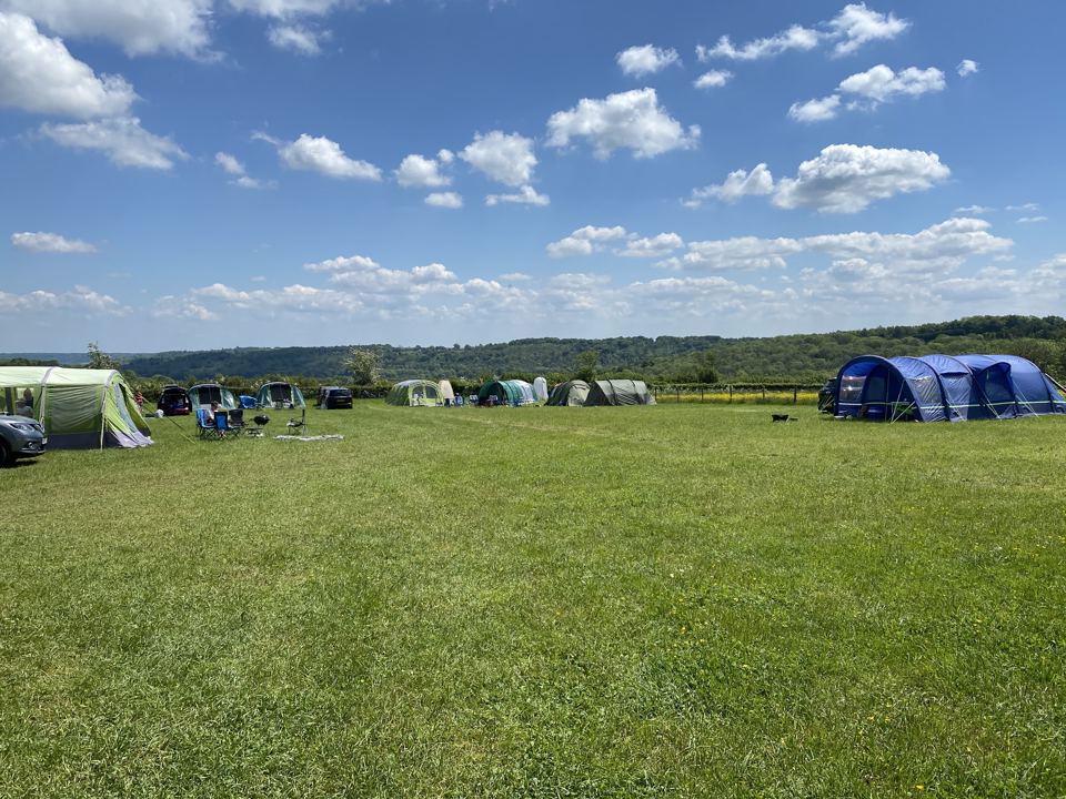 Tent field with view over the Chilterns
