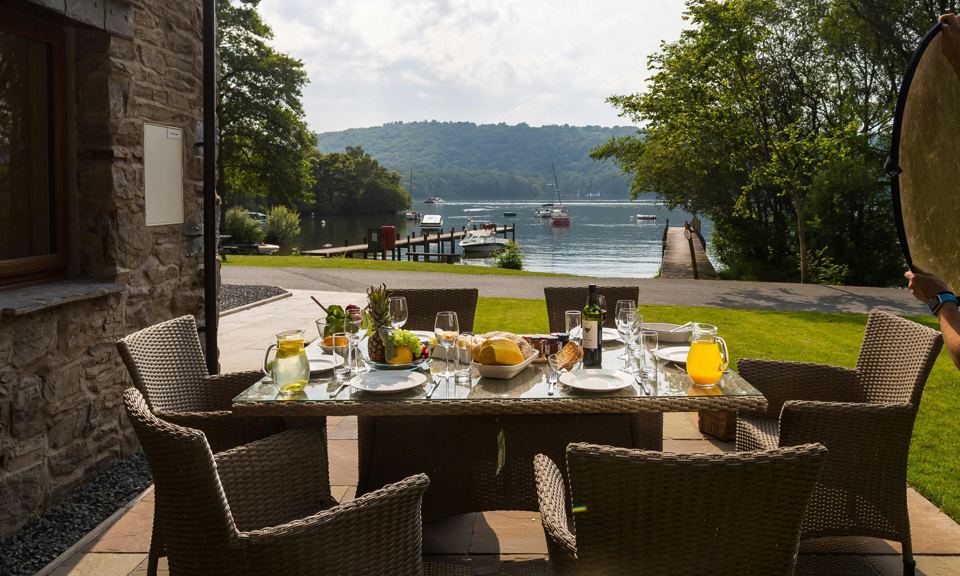 Terrace dining area with lake view
