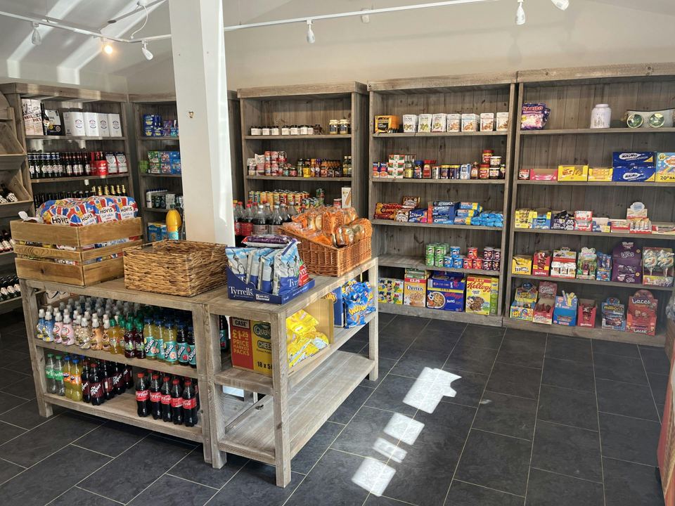 Shop shelves with groceries