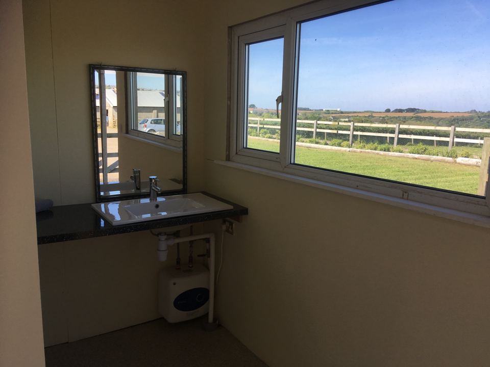 Washroom with sink and view