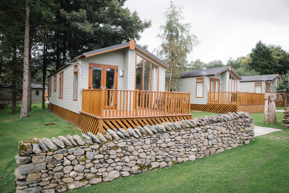 Lodge with deck and dry stone wall