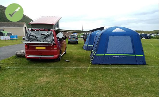 Campervan and awning on the grass