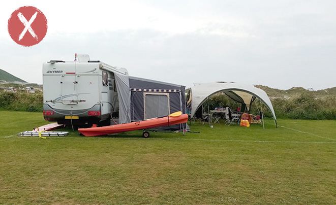 Motorhome with awning and kayak