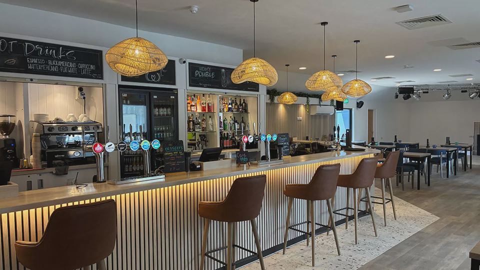 Bar with stools and pendant lights