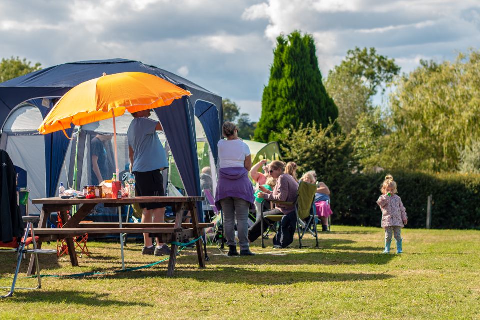 Tent pitches on the grass