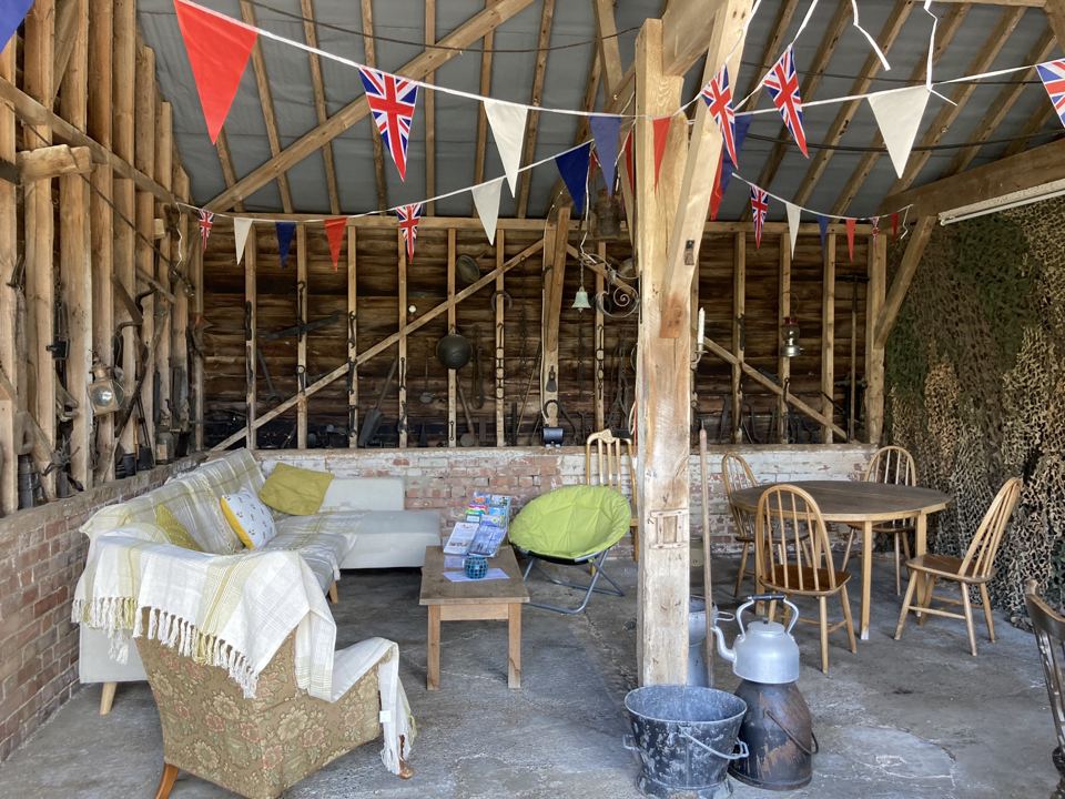 Covered communal barn with sofa