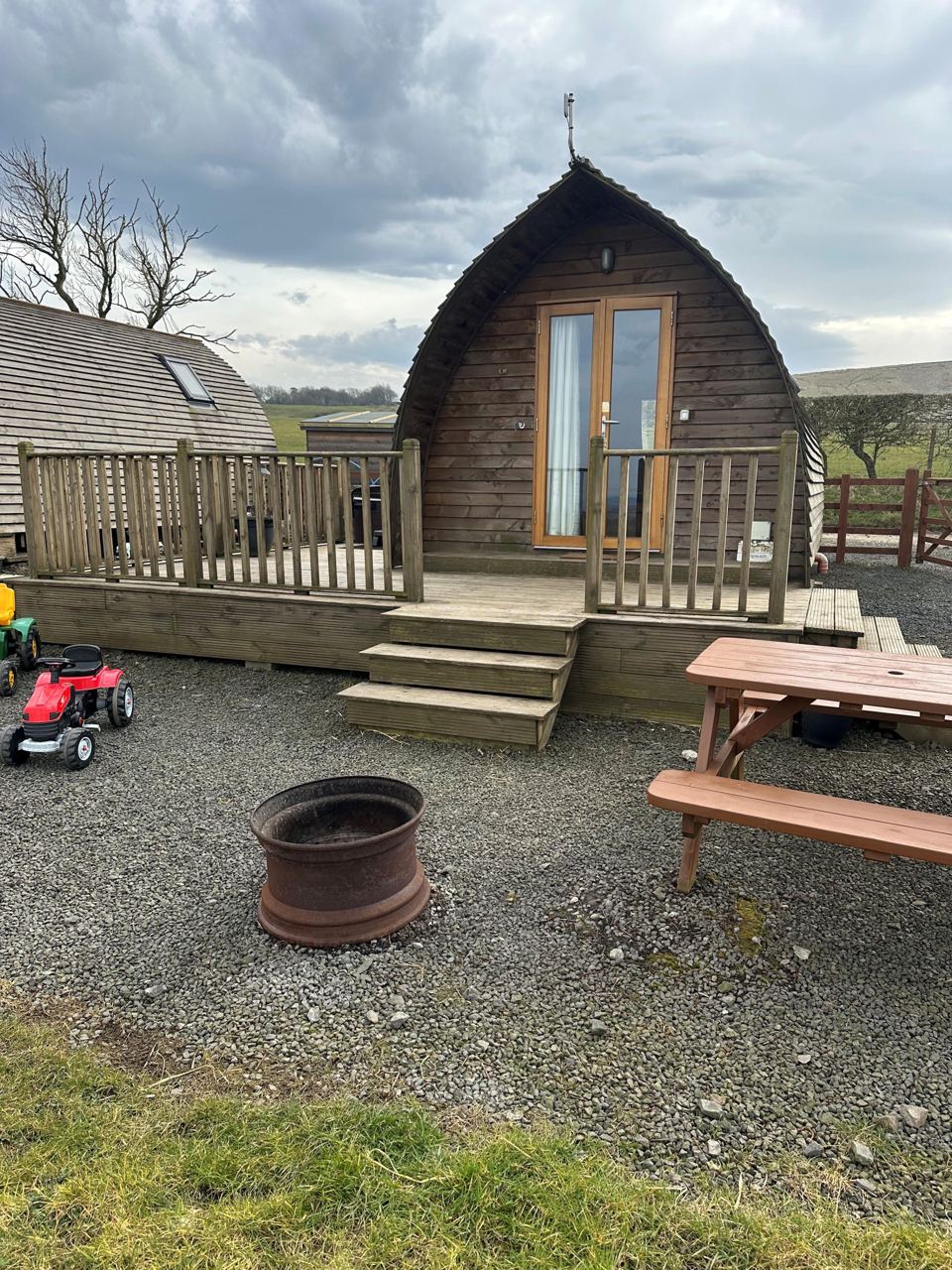 Wigwam with decking and fire pit