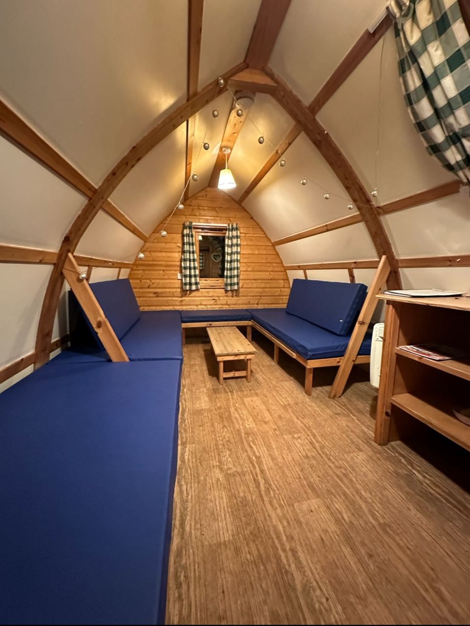 Inside a wigwam, seating area