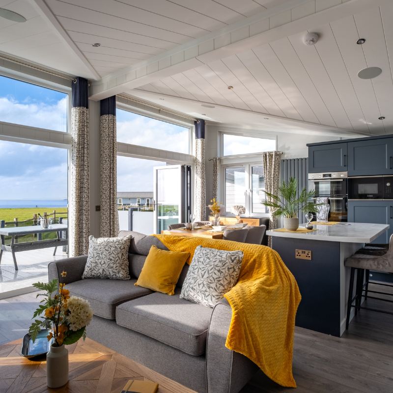 Inside a lodge, sea beyond