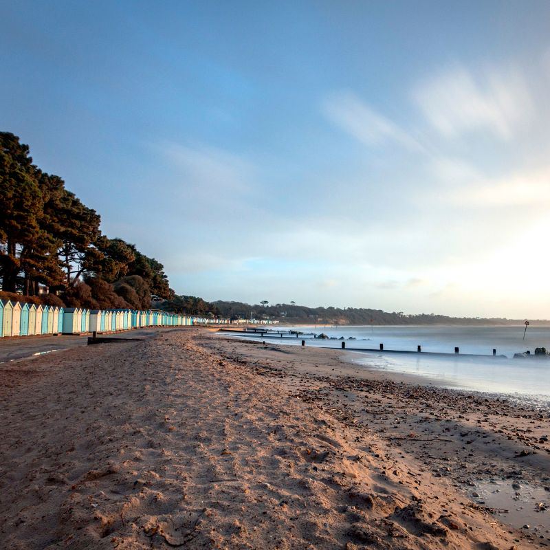 Beach with huts along the shore