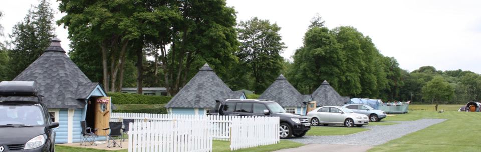Kelo lodges beside the field