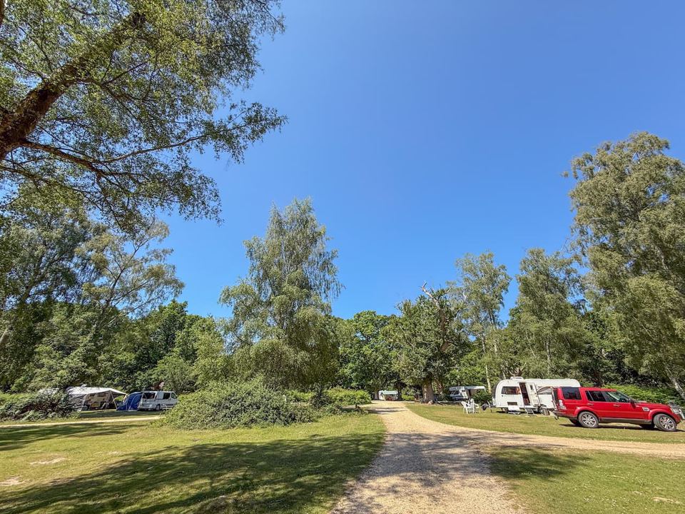 Caravans and cars along the track