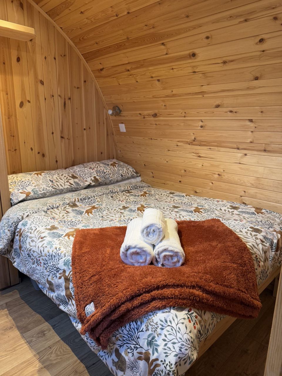 Inside a pod with a double bed