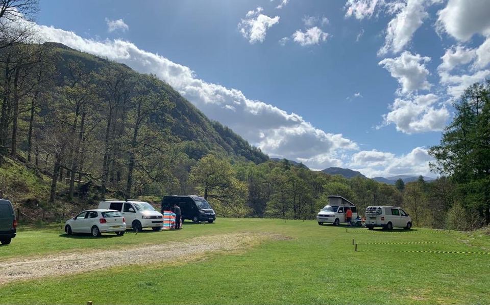 Cars and campers on the grass