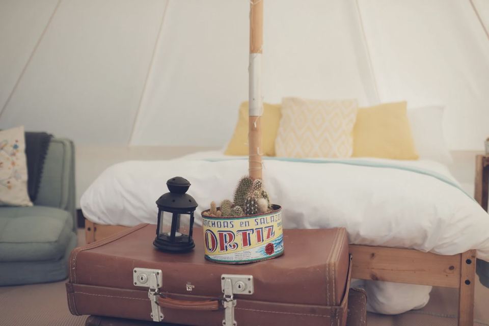 Bed inside a bell tent