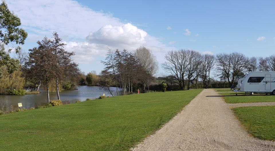 Lakeside pitches and gravel track