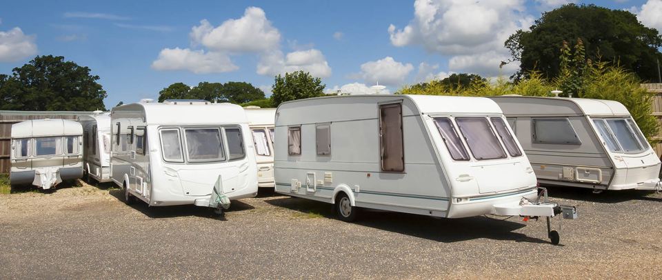 Touring caravans in storage