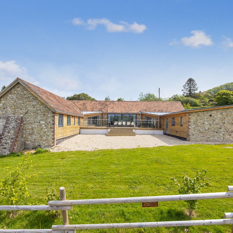 Stone barn conversion with lawn