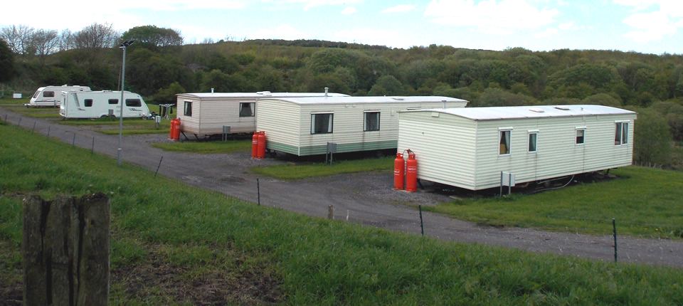 Static caravans on the hillside