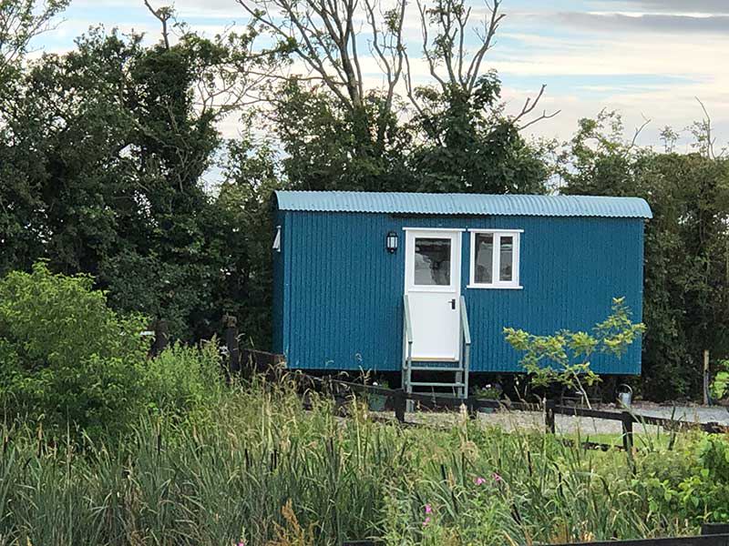Shepherd's hut beside the pond