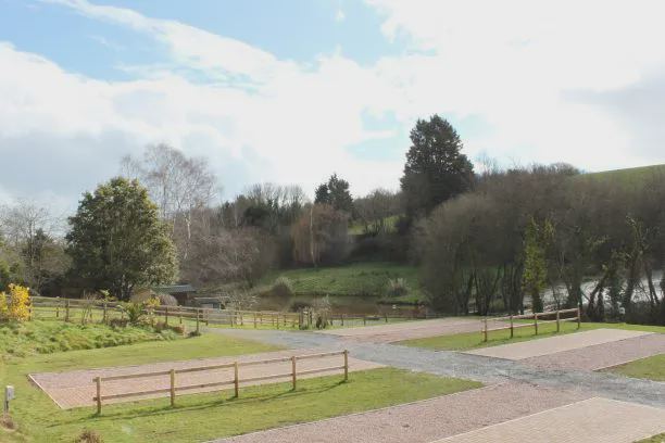 Gravel pitches beside the river