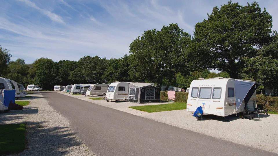 Hardstanding pitches along the road