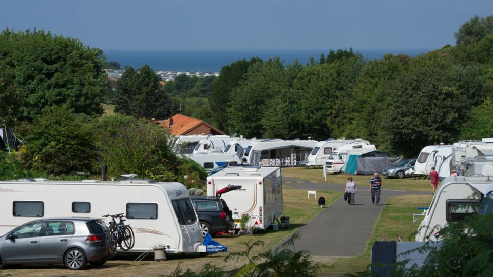 Terraced pitches above the sea