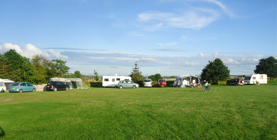 Caravans and tents on the field