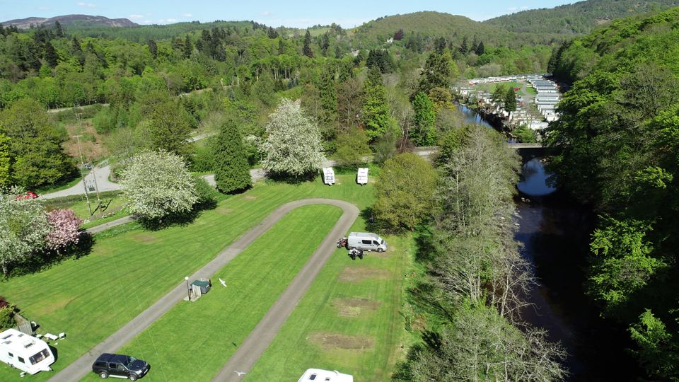 Grass pitches by the river